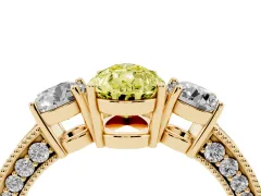 Fancy Yellow Pear Cut Diamond Three-Stone Ring Set in Yellow gold with Round Side Stones and Pavé Band