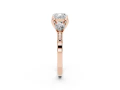 Cushion Cut Diamond Three-Stone Ring Set in Rose gold with Pavé Band and Smaller Side Stones