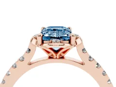 Fancy Blue Emerald Cut Diamond Solitaire Ring Set in Rose gold with Pavé Band and Floral Prong Setting