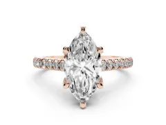 Marquise Cut Diamond Solitaire Ring Set in Rose gold with Brilliant Pavé Band and Prong Setting