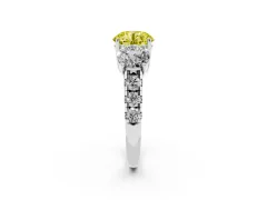 Fancy Yellow Round Cut Diamond Three-Stone Ring Set in White gold with Pavé Band