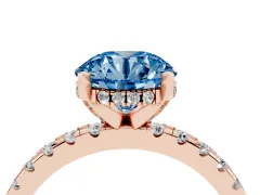 Fancy Blue Round Cut Diamond Pavé Solitaire Ring Set in Rose gold with Round Band Accents and Prong Setting