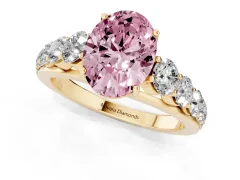 Fancy Pink Oval Cut Diamond Solitaire Ring Set in Yellow gold with Pavé-Set Band and Prong Setting