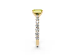 Fancy Yellow Emerald Cut Diamond Solitaire Ring Set in Yellow gold with Shared Prong Pavé Band