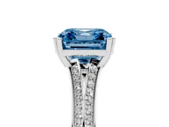 Fancy Blue Asscher Cut Diamond Split Shank Pavé Engagement Ring Set in White gold with Prong-Set Center Stone