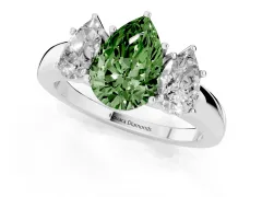 Fancy Green Pear Cut Diamond Three-Stone Ring Set in Platinum with Bold Center and Classic Band