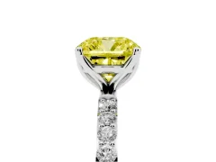 Fancy Yellow Cushion Cut Diamond Solitaire Engagement Ring Set in White gold with Round Pavé Band and Prong Setting