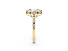 Marquise Cut Diamond Solitaire Engagement Ring Set in Yellow gold with Pavé Band and Prong Setting