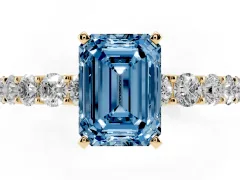 Fancy Blue Emerald Cut Diamond Solitaire Ring Set in Yellow gold with Shared Prong Pavé Band