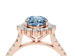 Fancy Blue Oval Cut Diamond Halo Ring Set in Rose gold with Pavé Band and Prong Setting