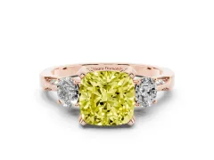 Fancy Yellow Cushion Cut Diamond Three-Stone Ring Set in Rose gold with Pavé Band and Smaller Side Stones