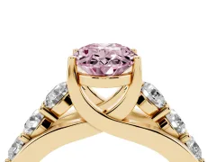 Fancy Pink Oval Cut Diamond Pavé Engagement Ring Set in Yellow gold with Prong Setting