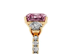 Fancy Pink Asscher Cut Diamond Three-Stone Ring Set in Yellow gold with Pavé Band and Graduated Sides