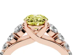 Fancy Yellow Oval Cut Diamond Solitaire Ring Set in Rose gold with Pavé-Set Band and Prong Setting