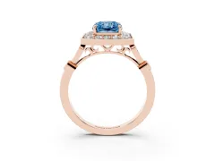 Fancy Blue Radiant Cut Diamond Halo Engagement Ring Set in Rose gold with Twisted Band and Prong Setting