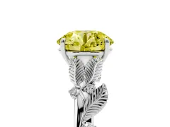 Fancy Yellow Round Cut Diamond Solitaire Ring Set in Platinum with Leaf Motif Band