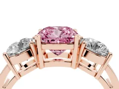 Fancy Pink Cushion Cut Diamond Three-Stone Ring Set in Rose gold with Round Side Stones and Classic Band