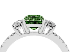 Fancy Green Emerald Cut Diamond Three-Stone Ring Set in White gold with Pavé Band and Graduated Sides