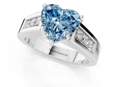 Fancy Blue Heart Cut Diamond Solitaire Ring Set in Silver with Channel-Set Accent Stones and Prong Setting