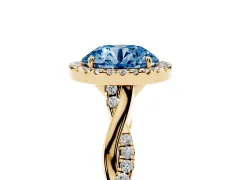 Fancy Blue Round Cut Diamond Halo Twist Band Solitaire Ring Set in Yellow gold with Prong Setting