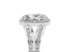 Oval Cut Diamond Halo Split Shank Pavé Ring Set in White gold with Prong Setting