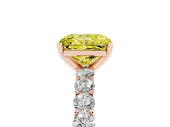 Fancy Yellow Radiant Cut Diamond Solitaire Ring Set in Rose gold with Shared Prong Pavé Band