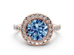 Fancy Blue Round Cut Diamond Halo Ring Set in Rose gold with Pavé Shank and Prong Setting