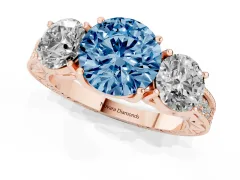 Fancy Blue Round Cut Diamond Three-Stone Engagement Ring Set in Rose gold with Milgrain Pavé Band