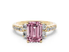 Fancy Pink Emerald Cut Diamond Three-Stone Pavé Ring Set in Yellow gold with Prong Setting