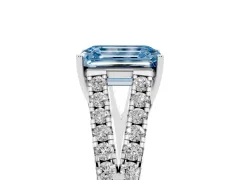 Fancy Blue Emerald Cut Diamond Split Shank Pavé Engagement Ring Set in White gold with Prong-Held Center Stone