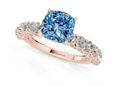 Fancy Blue Cushion Cut Diamond Solitaire Ring Set in Rose gold with Shared Prong Pavé Band