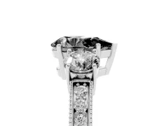 Fancy Black Pear Cut Diamond Three-Stone Ring Set in Platinum with Round Side Stones and Pavé Band