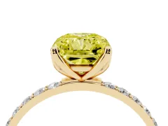 Fancy Yellow Radiant Cut Diamond Solitaire Engagement Ring Set in Yellow gold with Round Pavé Band and Prong Setting