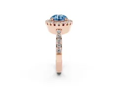 Fancy Blue Round Cut Diamond Halo Ring Set in Rose gold with Pavé Shank and Prong Setting