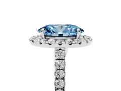 Fancy Blue Oval Cut Diamond Halo Pavé Engagement Ring Set in Platinum with Prong Setting