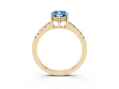 Fancy Blue Cushion Cut Diamond Solitaire Engagement Ring Set in Yellow gold with Pavé Band and Prong Setting