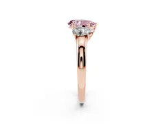 Fancy Pink Pear Cut Diamond Three-Stone Ring Set in Rose gold with Bold Center and Classic Band