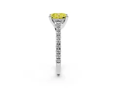 Fancy Yellow Radiant Cut Diamond Solitaire Ring Set in Platinum with Brilliant Pavé Band and Prong Setting