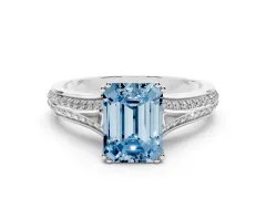Fancy Blue Emerald Cut Diamond Split Shank Pavé Engagement Ring Set in Platinum with Prong-Set Center Stone