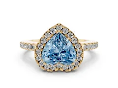 Fancy Blue Heart Cut Diamond Pavé Halo Ring Set in Yellow gold with Prong Setting