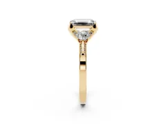 Fancy Pink Emerald Cut Diamond Three-Stone Ring Set in Yellow gold with Pavé Band and Smaller Side Stones
