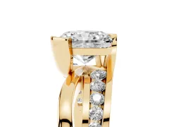 Radiant Cut Diamond Solitaire Ring Set in Yellow gold with Channel Set Split Shank and Tension Prongs