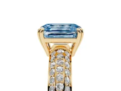 Fancy Blue Emerald Cut Diamond Solitaire Ring Set in Yellow gold with Multi-Row Round Pavé Band and Prong Setting