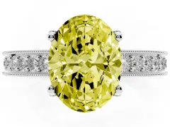 Fancy Yellow Oval Cut Diamond Solitaire Ring Set in Silver with Milgrain-Edged Pavé Band and Prong Setting