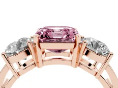 Fancy Pink Asscher Cut Diamond Three-Stone Ring Set in Rose gold with Round Side Stones and Classic Band