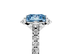 Fancy Blue Princess Cut Diamond Solitaire Ring Set in Platinum with Pavé Band and Floral Prong Setting