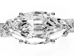 Marquise Cut Diamond Ring Set in White gold with Scattered Round Accents