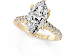 Marquise Cut Diamond Solitaire Ring Set in Yellow gold with Brilliant Pavé Band and Prong Setting