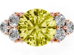 Fancy Yellow Round Cut Diamond Solitaire Ring Set in Rose gold with Cluster Accents on Each Side