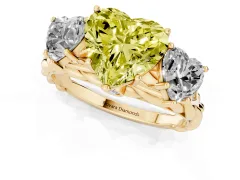 Fancy Yellow Heart Cut Diamond Three-Stone Ring Set in Yellow gold with Braided Band